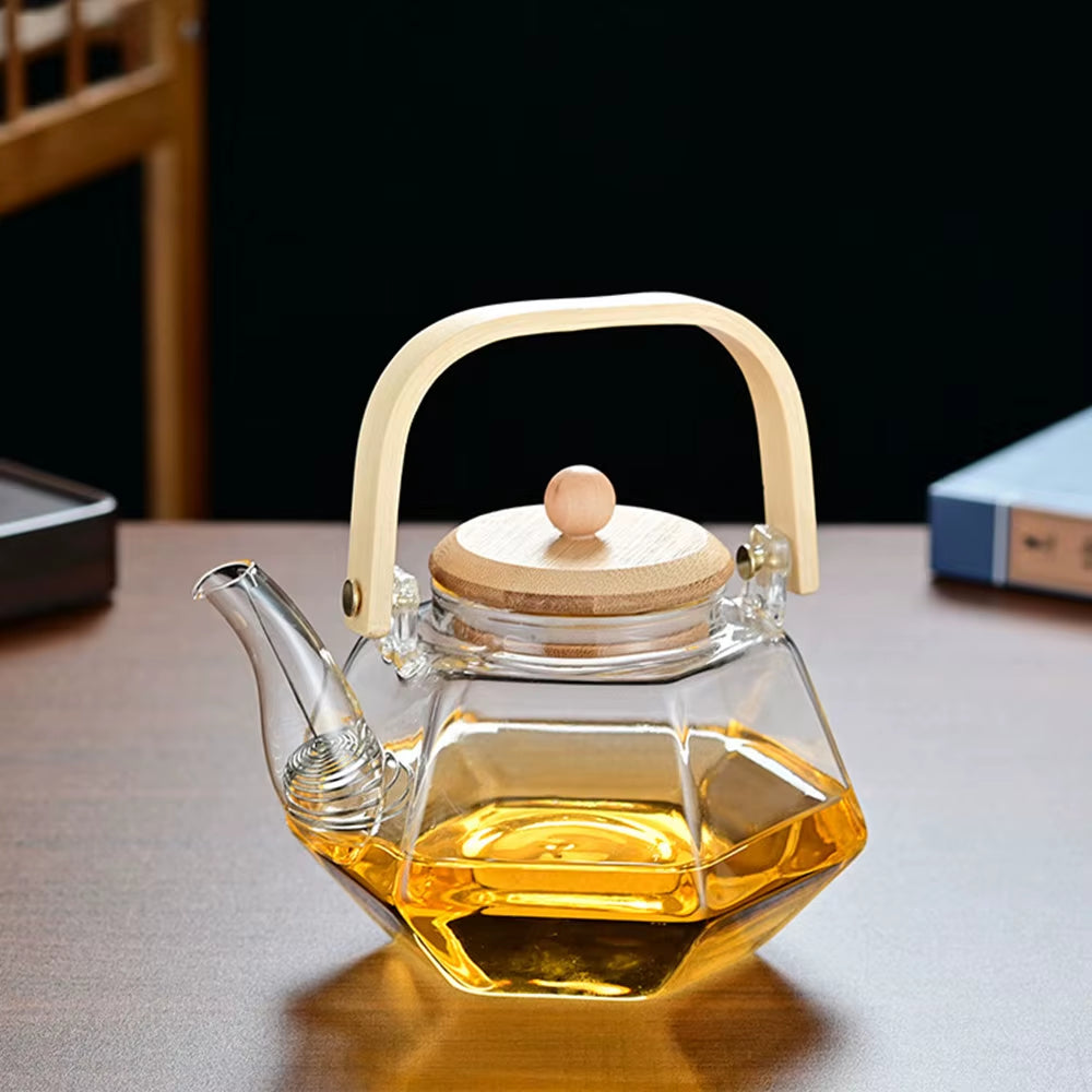 Tetera de vidrio resistente al calor con forma de diamante, con infusor extraíble.