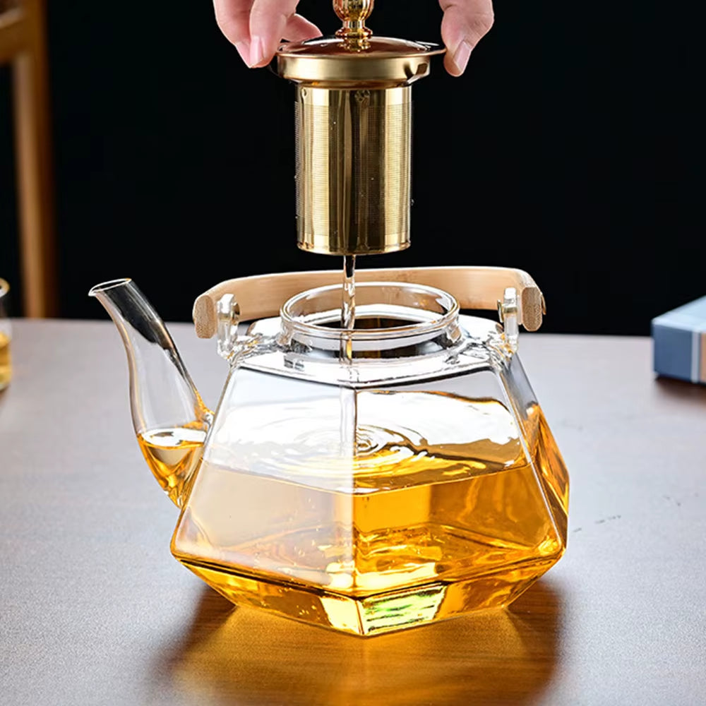 Tetera de vidrio resistente al calor con forma de diamante, con infusor extraíble.