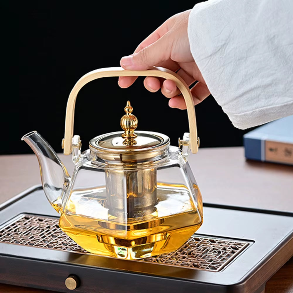 Tetera de vidrio resistente al calor con forma de diamante, con infusor extraíble.