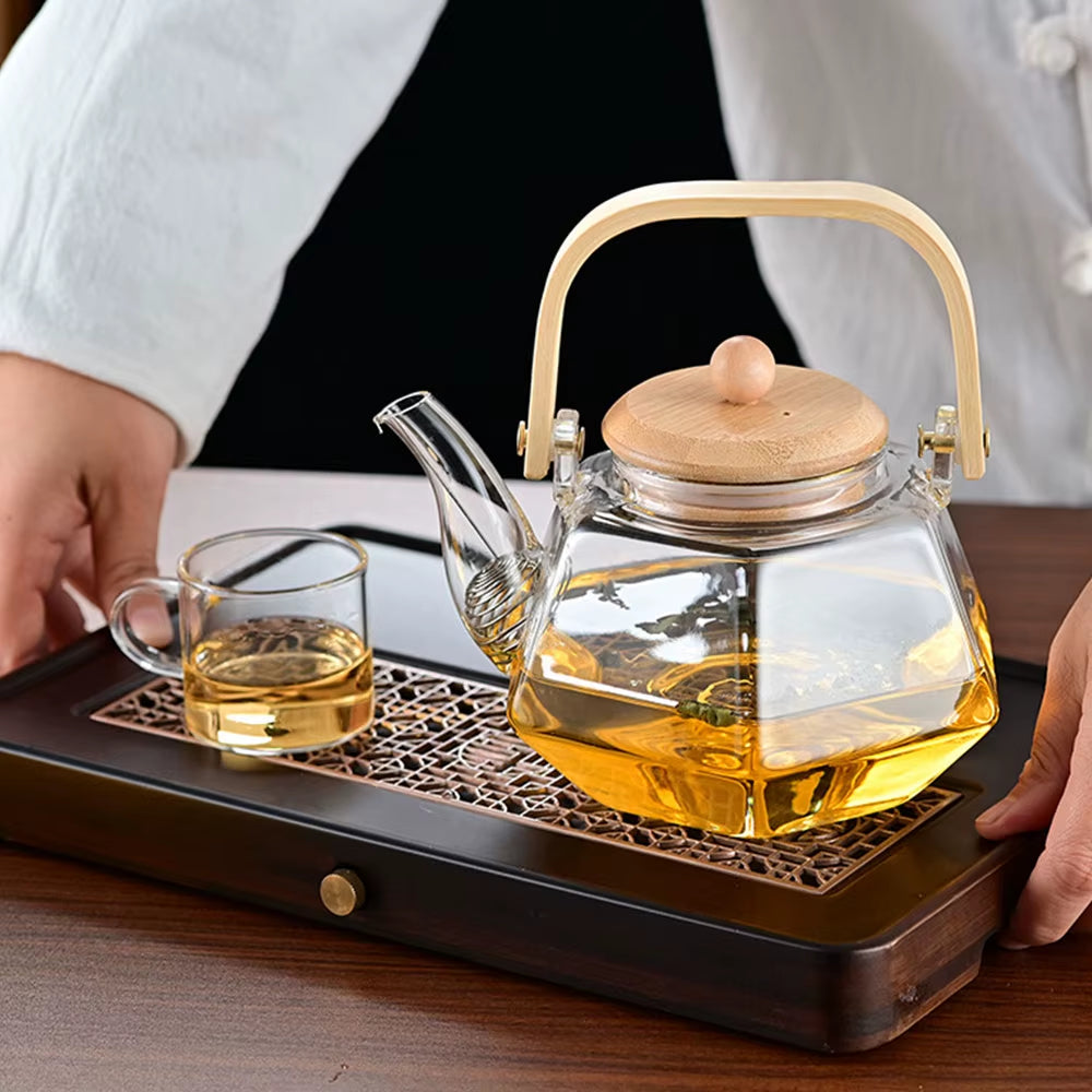 Tetera de vidrio resistente al calor con forma de diamante, con infusor extraíble.